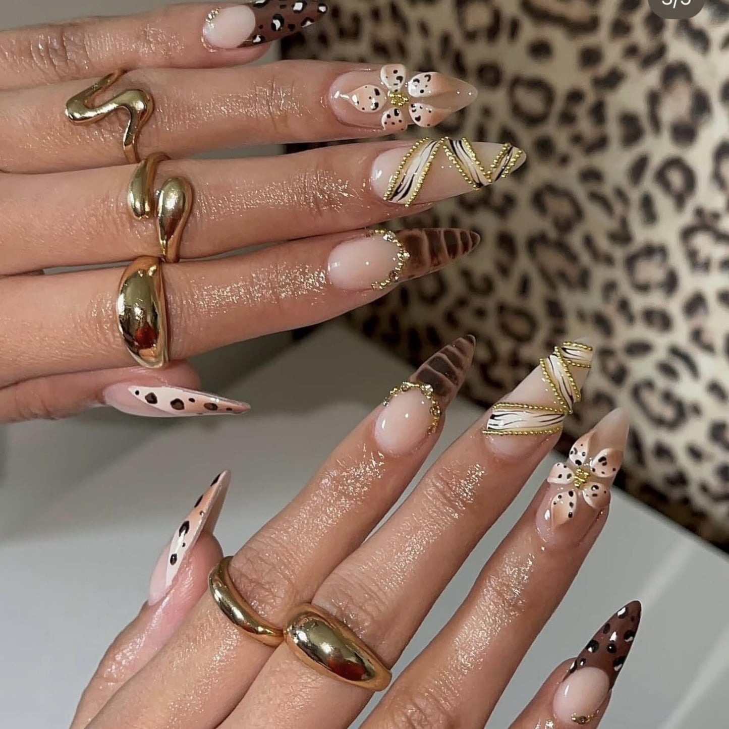 SEENEEY Long Almond Press on Nails Brown Fake Nails French Artificial Nail 3D Floral and Gold Charm Designs Cute Stick on Nail for Women 24pcs