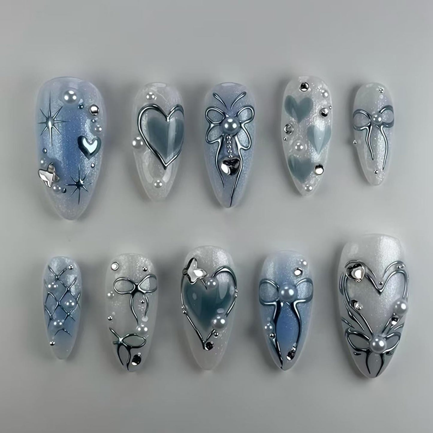 Blue Press on Nails Medium Almond Fake Nails with 3D Diamond Pearl Star Charms Acrylic Nails Press ons Cute Design Heart-shaped Press ons Gradient Bow Silver Star Stick on Nails for Women Daily Wear
