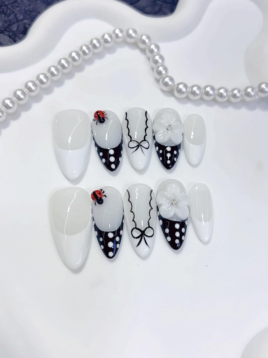 Haozerart Handmade Press on Nails, Medium Almond Shape Fake Nails, Black French Tip with White Polka Dot, Cute Reusable False Nails 10Pcs for Women & Girls (M Size)