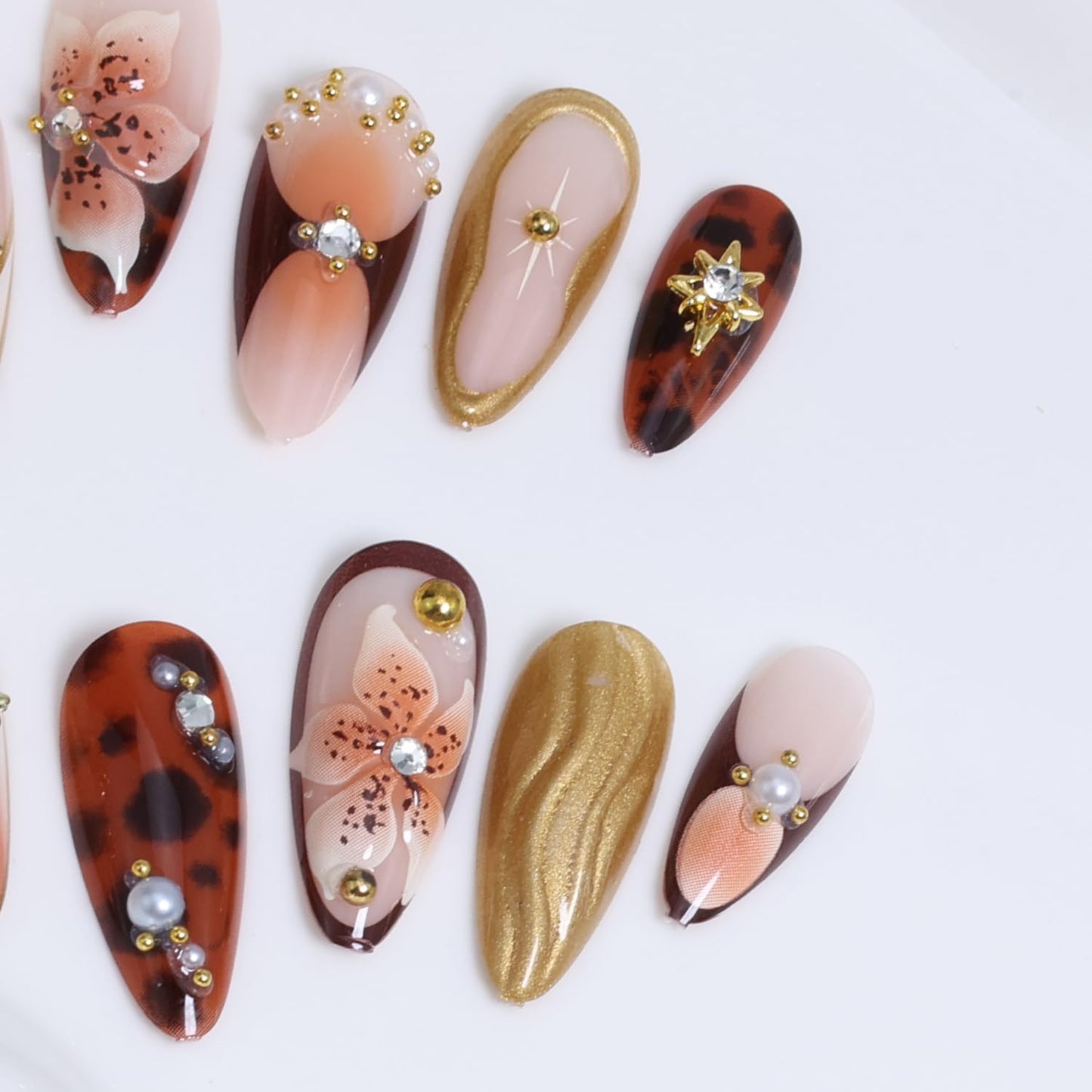 24Pcs Almond Press on Nails Medium Fake Nails with Brown Flower Designs French Nails Star Press ons Pearl Jewelry Glue on Nails 3D Gold Texture False Nails Acrylic Nails Cute Stick on Nails for Women