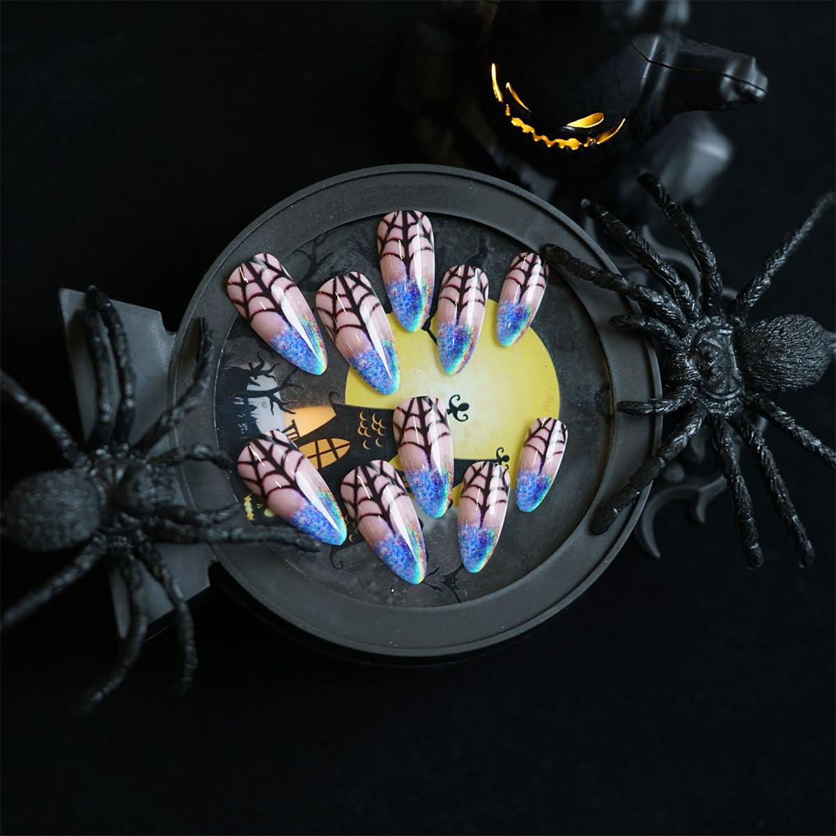 Halloween Press on Nails Medium Almond NEWSPIED Blue Laser Glitter French Tip Fake Nails with Spider Web Designs Reusable Halloween Glue on Nails Glossy Artificial Nails Sets for Women and Gilrs 24Pcs