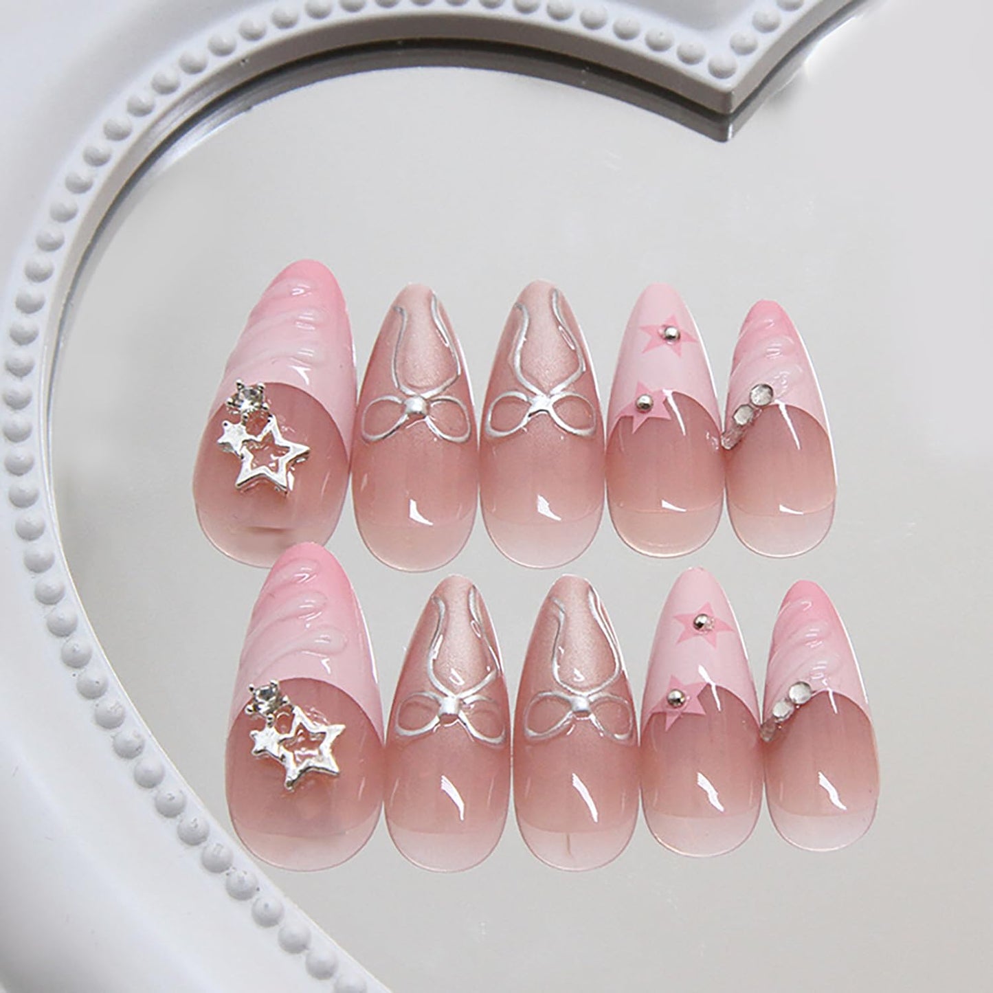 RIICFDD 24 Pcs Medium Almond Press on Nails Pink Fake Nails Star Nails Press ons 3D Water Ripple Glue on Nails Bow Rhinestone Nail Charms Full Cover Glossy Acrylic Nails for Women French Nails