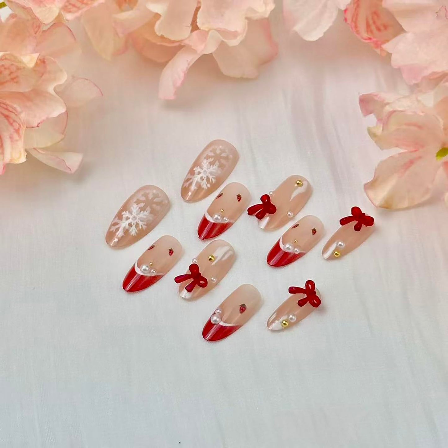 30pcs Christmas Press on Nails Medium Almond French Tip Fake Nails Winter Snowflake Full Cover False Nails with 3d Bow Rhinestones Designs Glue on Nails Valentine Nude Glossy Acrylic Nail for Women