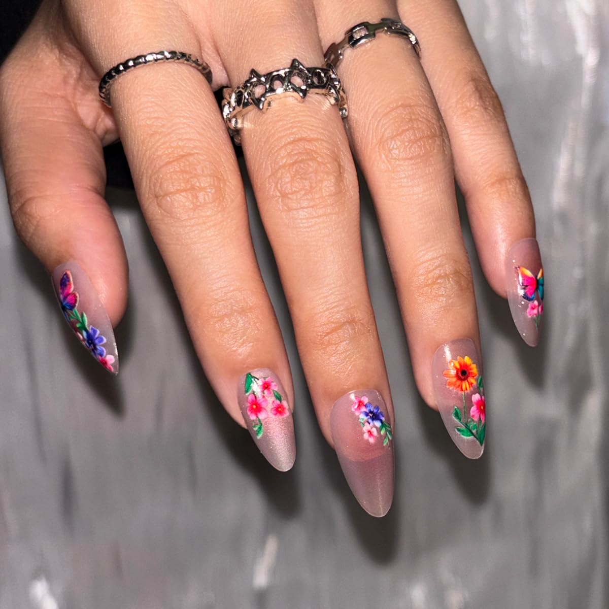 Spring Press on False Nails Pink Cat Eye Glue on Nails Medium Almond Fake Nails with Colorful Butterfly Flower Designs Glossy Press ons Stick on Nail for Women Manicure 24Pcs