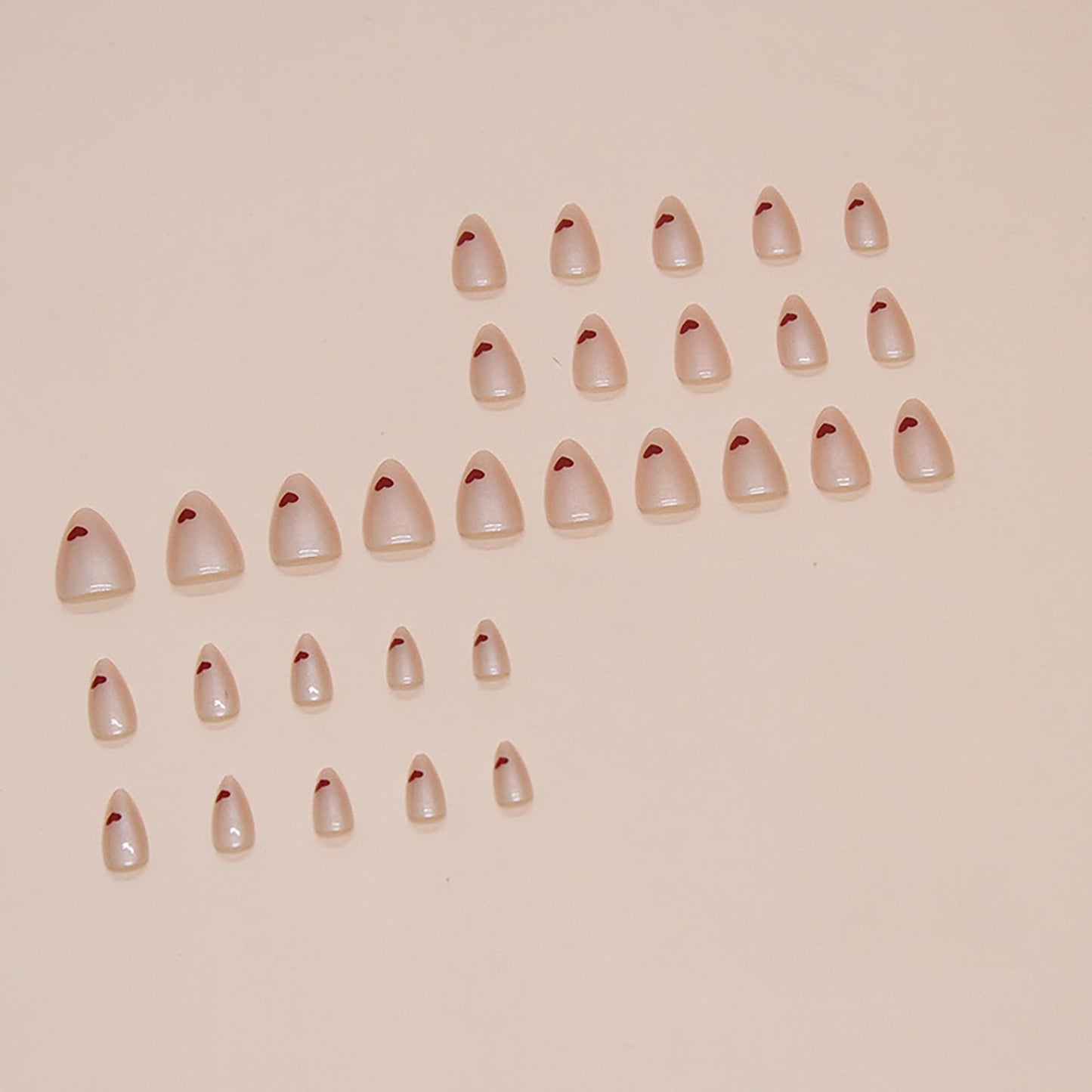 Short Almond Press on Nails Nude Pink Fake Nails With Designs Heart Motif Nails Press ons Acrylic Nails False Glossy Artificial Full Cover Stick on Nails for Women Girls 24 Pcs