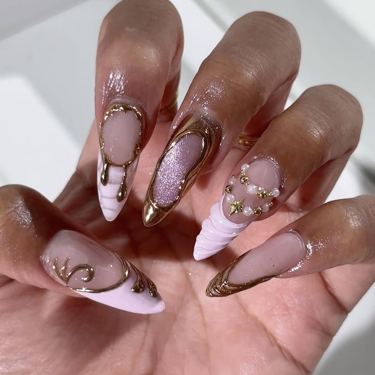 plalely Almond Press on Nails Long Pink Fake Nailwith 3D Charms Acrylic Nail Press ons Golden Embossed Stick on Nails for Women 24pcs
