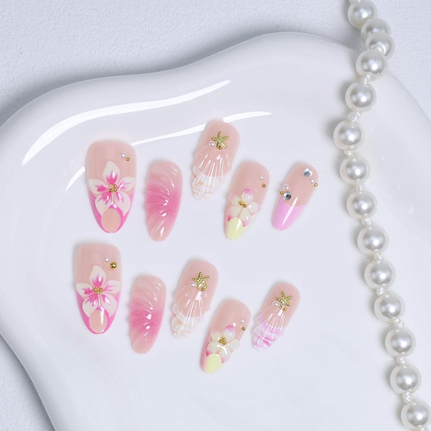 Cute Flower Press on Nails Medium Almond French Tip Fake Nails 3D Pink Gradient Flowers False Nails with Rhinestone Gold Beads Charms Design Acrylic Nails Golden Starfish Glue on Nail for Women 30Pcs