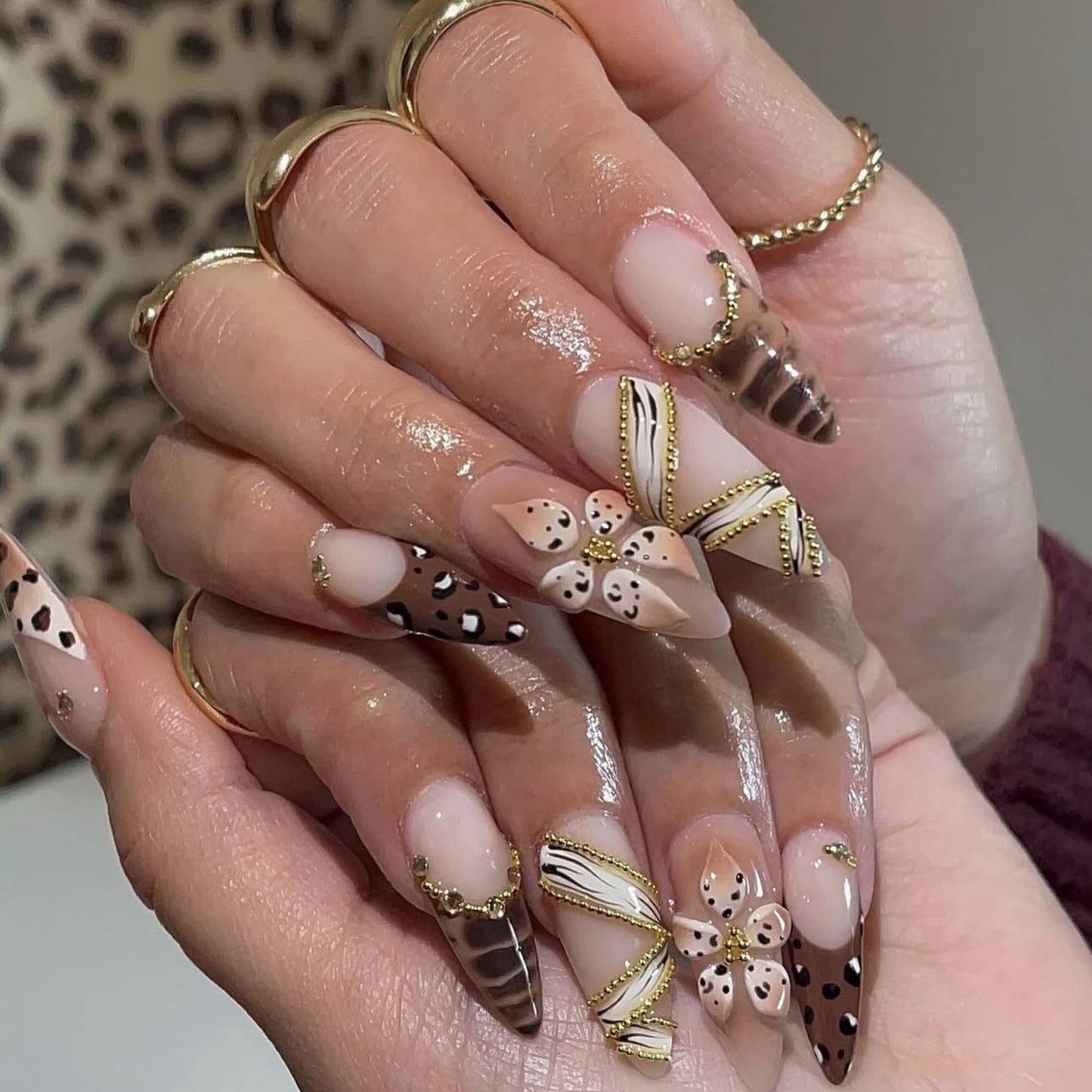 SEENEEY Long Almond Press on Nails Brown Fake Nails French Artificial Nail 3D Floral and Gold Charm Designs Cute Stick on Nail for Women 24pcs