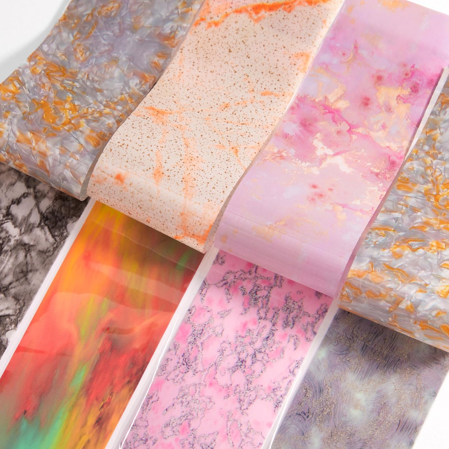 DANNEASY 300 Sheets Holographic Nail Foils Film, Iridescent Nail Art Transfer Foil Stickers Marble Leopard Print Foil Paper Sheets Starry Sky Star Design Sticker for Nails Decoration Supplies