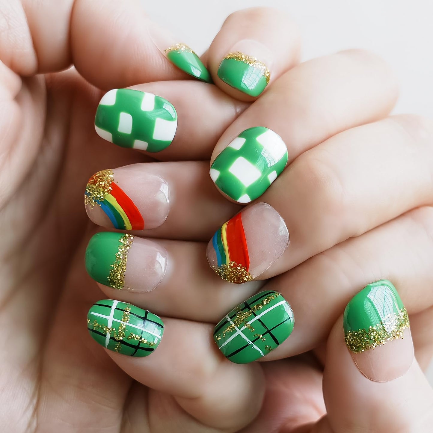 Tesytto Extra Short Press On Nails - Nude Base with Green French Tips & Gold Glitter, Hand-Painted Plaid & Rainbow,Easy to Apply & Remove (Size S)