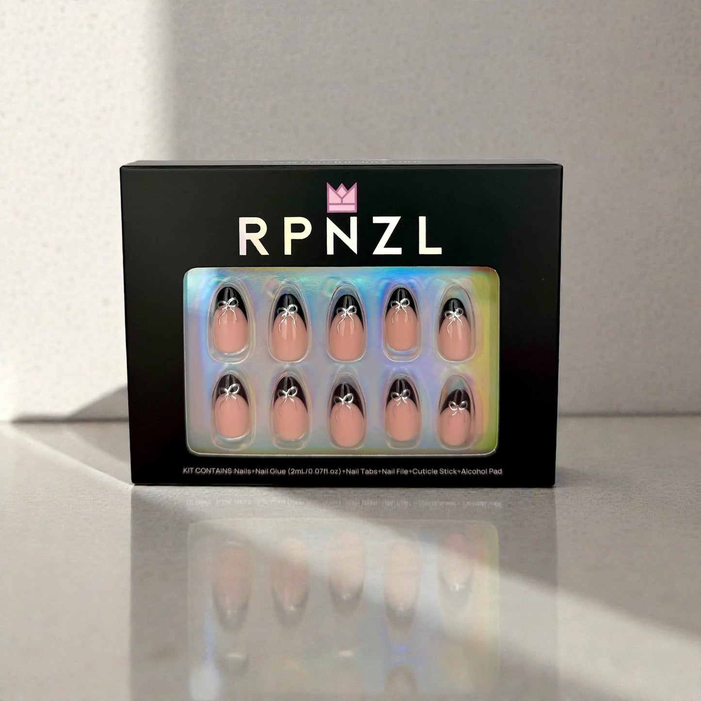 RPNZL Press On Nails - Black Tie | Black French Tip Press on Nails with 3D Bow Design - Soft Gel Almond Fake Nails I 32 Nails, 16 Sizes Kit with Glue and Adhesive Tabs I Female Founded