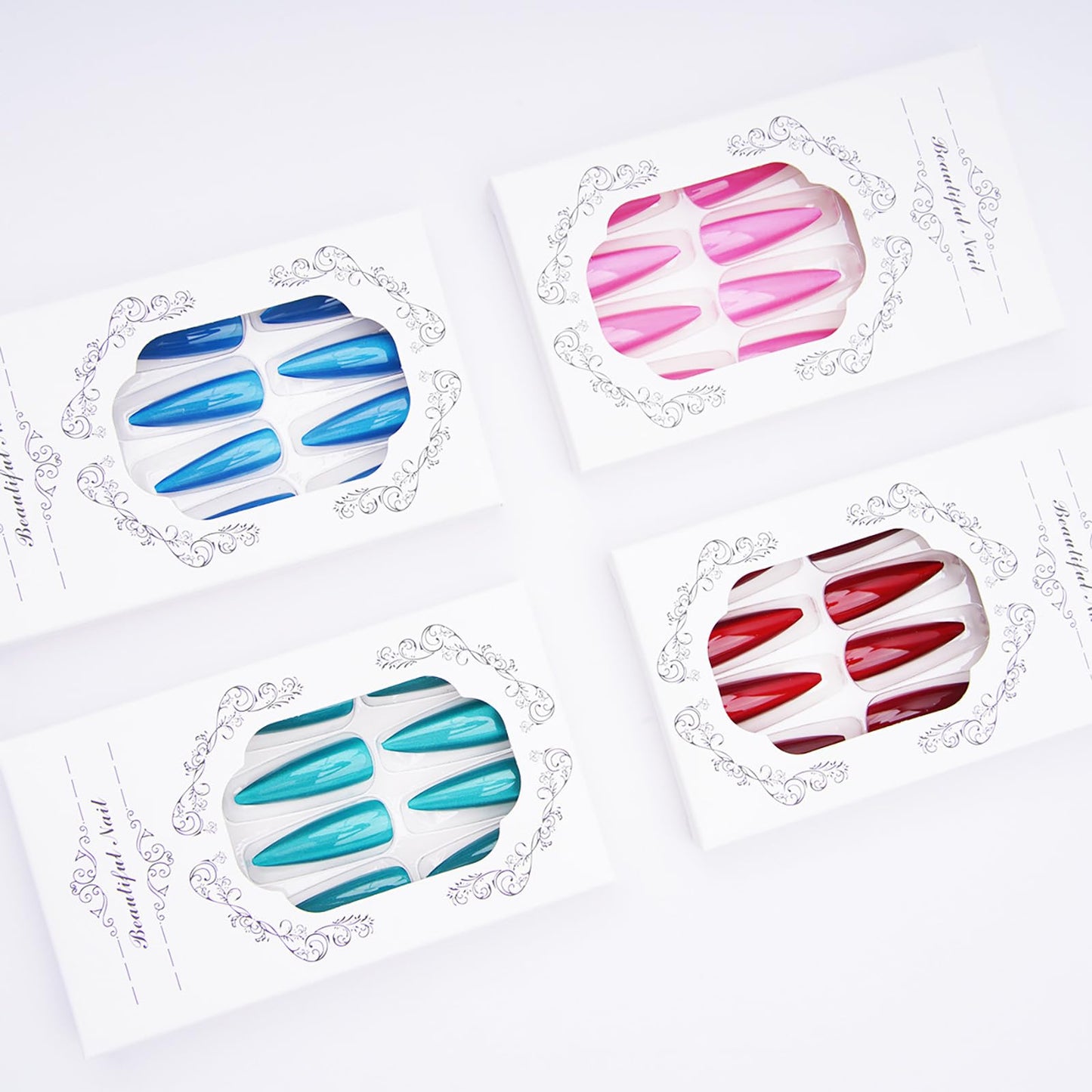 KKUUOO 4 Pack Stiletto Press on Nails Long - 4 Color Fake Nails with Glitter | Full Cover Glossy Acrylic Nail,Reusable False Nails Women 96Pcs(Red Pink Blue Lake Blue)