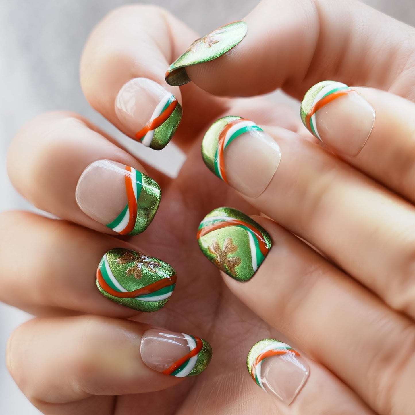 Tesytto Short Round Press On Nails, Green Glitter with Multicolor Line & Gold Clover Accents, Handmade Reusable Full Cover Nail Art (Size L)