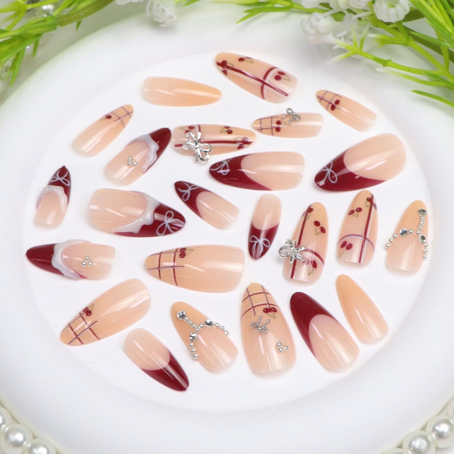 Almond Press on Nails Medium Fake Nails Red French Nails Press ons Glossy Glue on Nail with 3D Bow Pearl Rhinestones Lines Cherry Designs Nude Stick on Nails for Women 24Pcs
