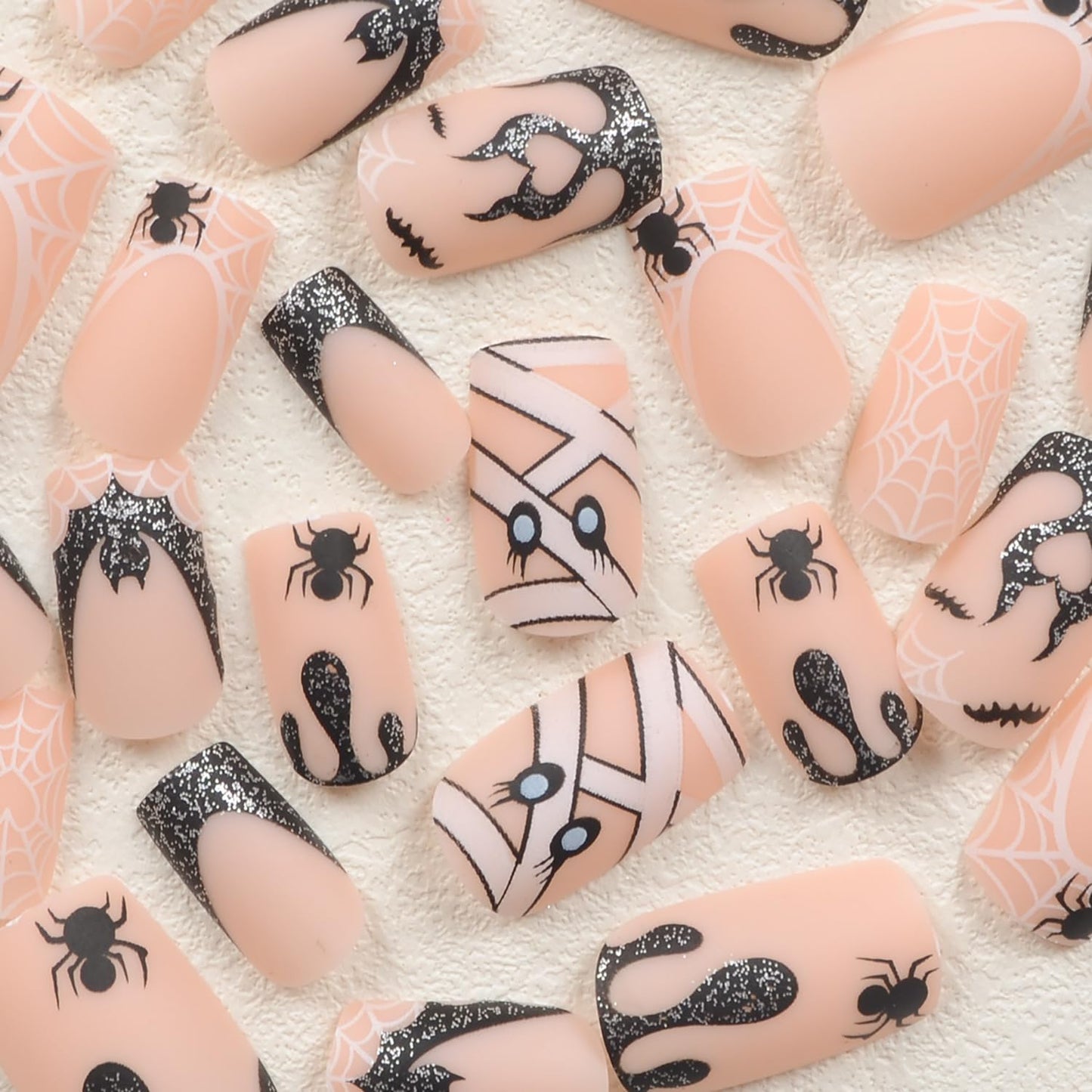Press on Nails Halloween Square French Tip Fake Nails Mummy and Cobweb Designs Stick on Nail Nude Color Acrylic Nail Halloween Glue on Nails Full Cover Matte False Nails for Women Girls 24Pcs