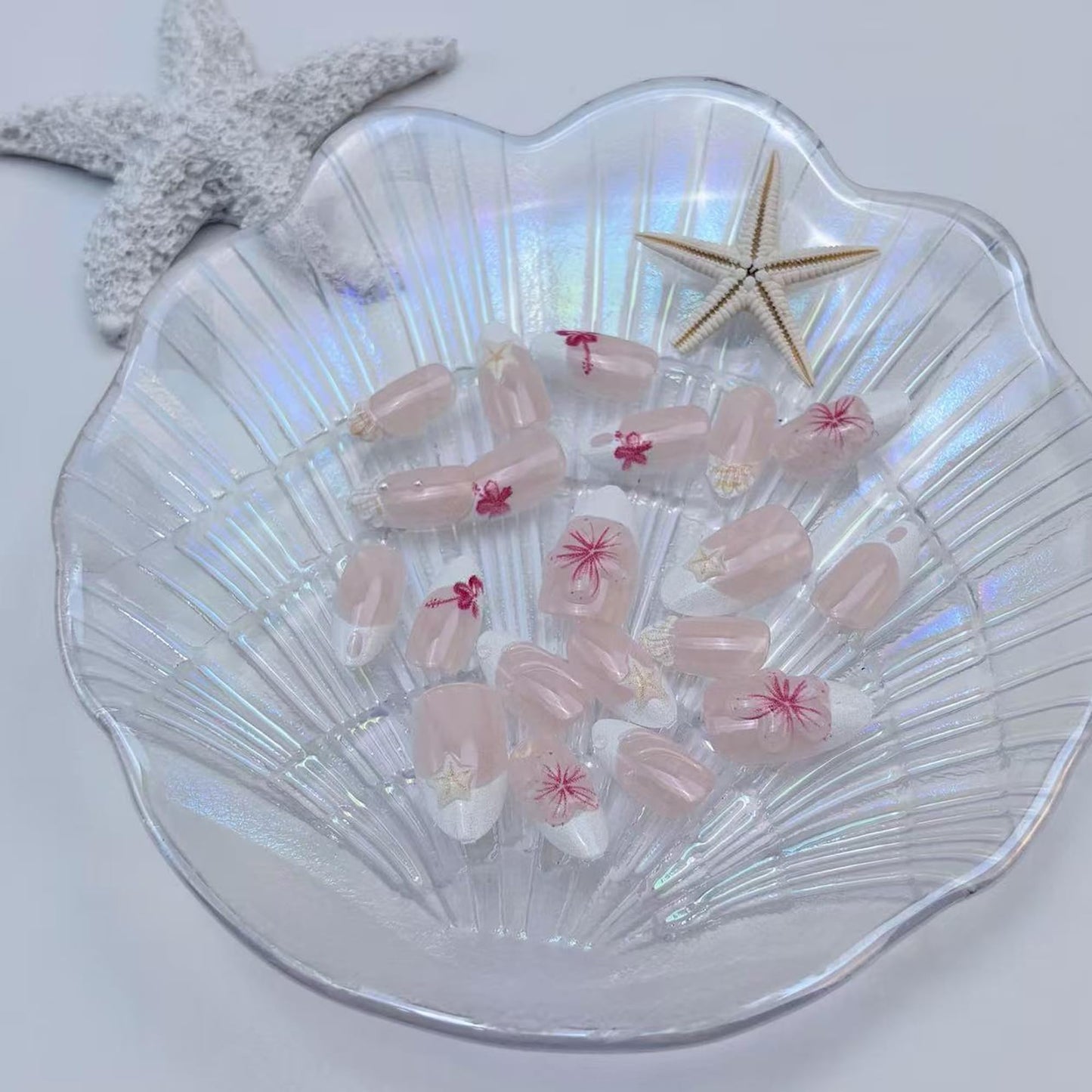 30Pcs Short Almond Press On Nails, Summer Beach Theme False Nails with 3D Pink Flowers, Starfish, Shell, Gold Stars & Pearls, Nude Pink French Tip Acrylic Nail Set for Women DIY Manicure