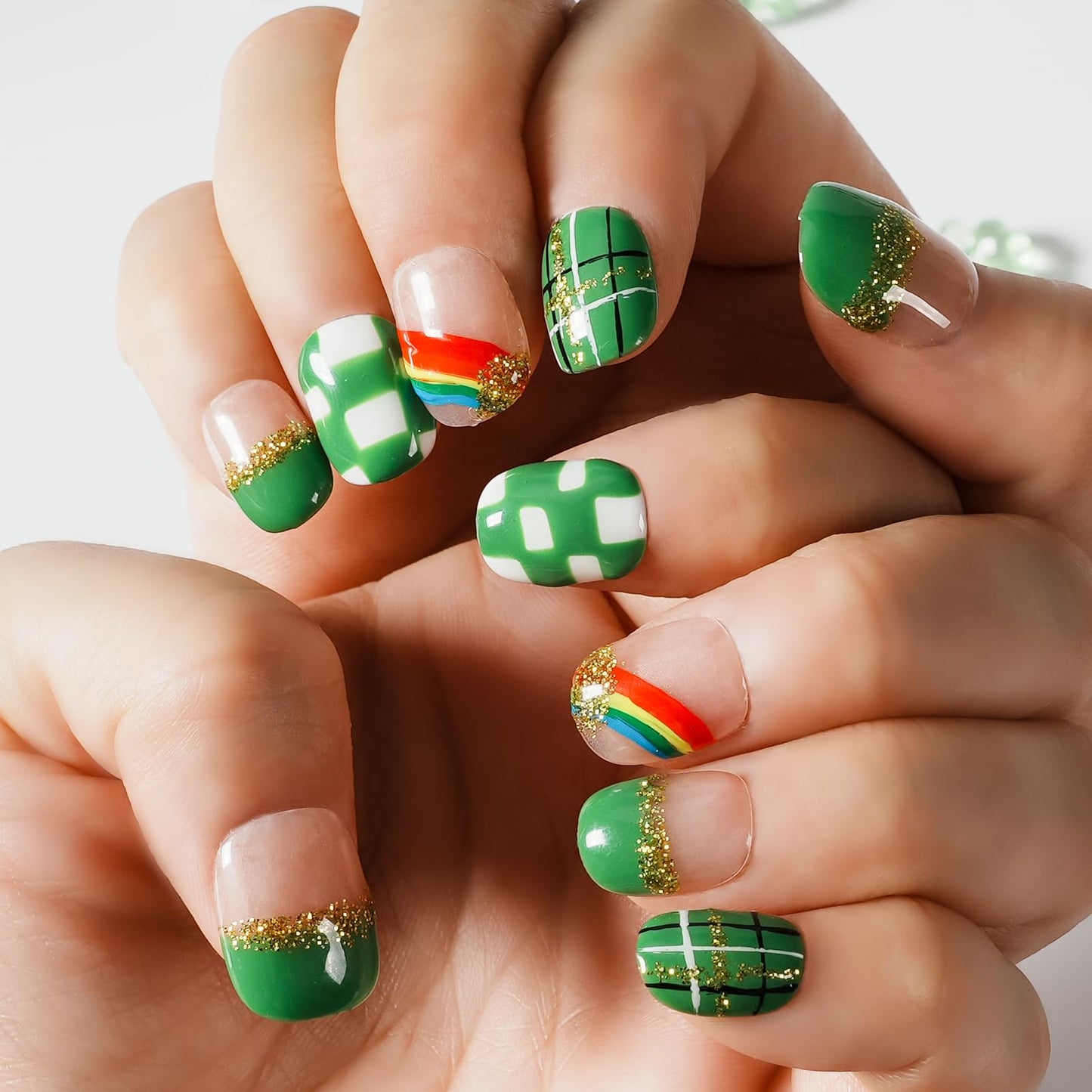 Tesytto Extra Short Press On Nails - Nude Base with Green French Tips & Gold Glitter, Hand-Painted Plaid & Rainbow,Easy to Apply & Remove (Size S)