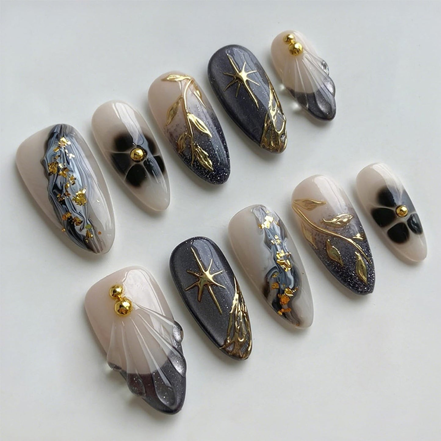 Marble Texture Gold Foil Press on Nails Medium Almond Fake Nails 3D Golden Leaf Star False Nails Cute Flower Acrylic Nails French Tip Glue on Nails Glitter Full Cover Stick on Nails for Women 30Pcs