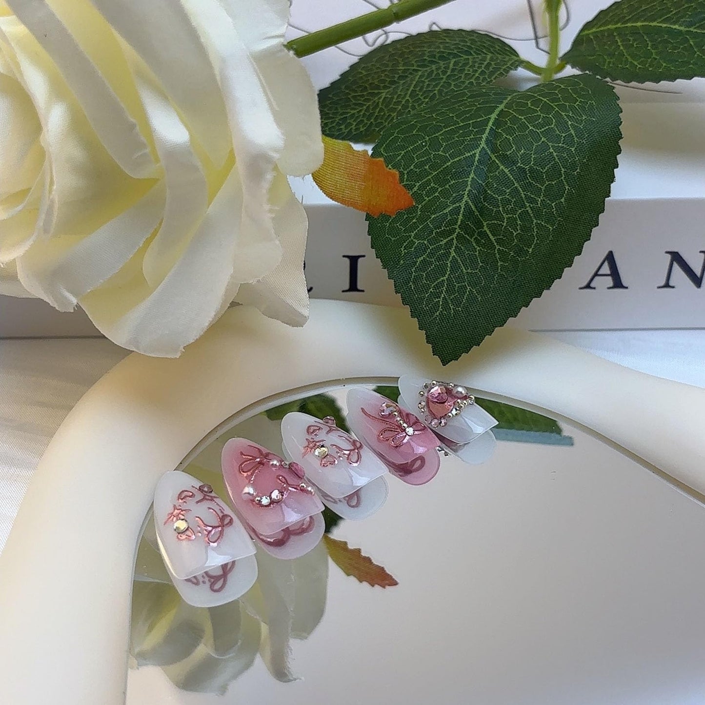 LBPEPAMZ Pink Press on Nails Medium Almond Fake Nails with 3D Heart Pearl Rhinestones Designs White Gradient Bow Silver Star Stick on Nails Flower Charms Full Cover Glue on Nails for Women Girls 24Pcs