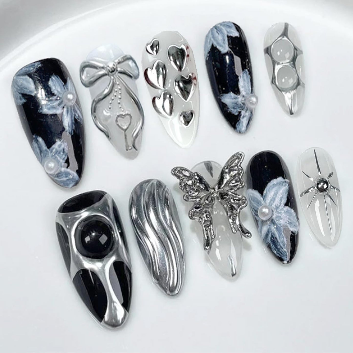24Pcs Handmade Y2K Press on Nails Almond Fake Nail with 3D Butterfly & Silver Bow Heart Star Irregular Pattern Flower Pearl False Nail Gothic Punk Black Nail Tip French Tip Stick on Nail for Women