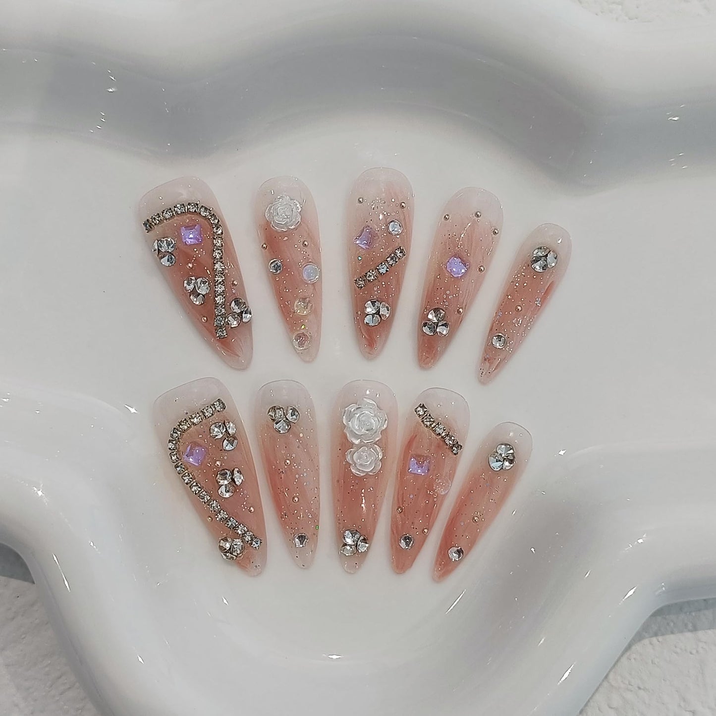 TENPAL Extra Long Stiletto Fake Nails with Coral Shimmer Base,3D Floral Chains Camellia Press on Nails Long Drop Shape,10pcs Versatile Soft Gel False Nails with Tools,Crystal Glitter Nails(XS,Orange)
