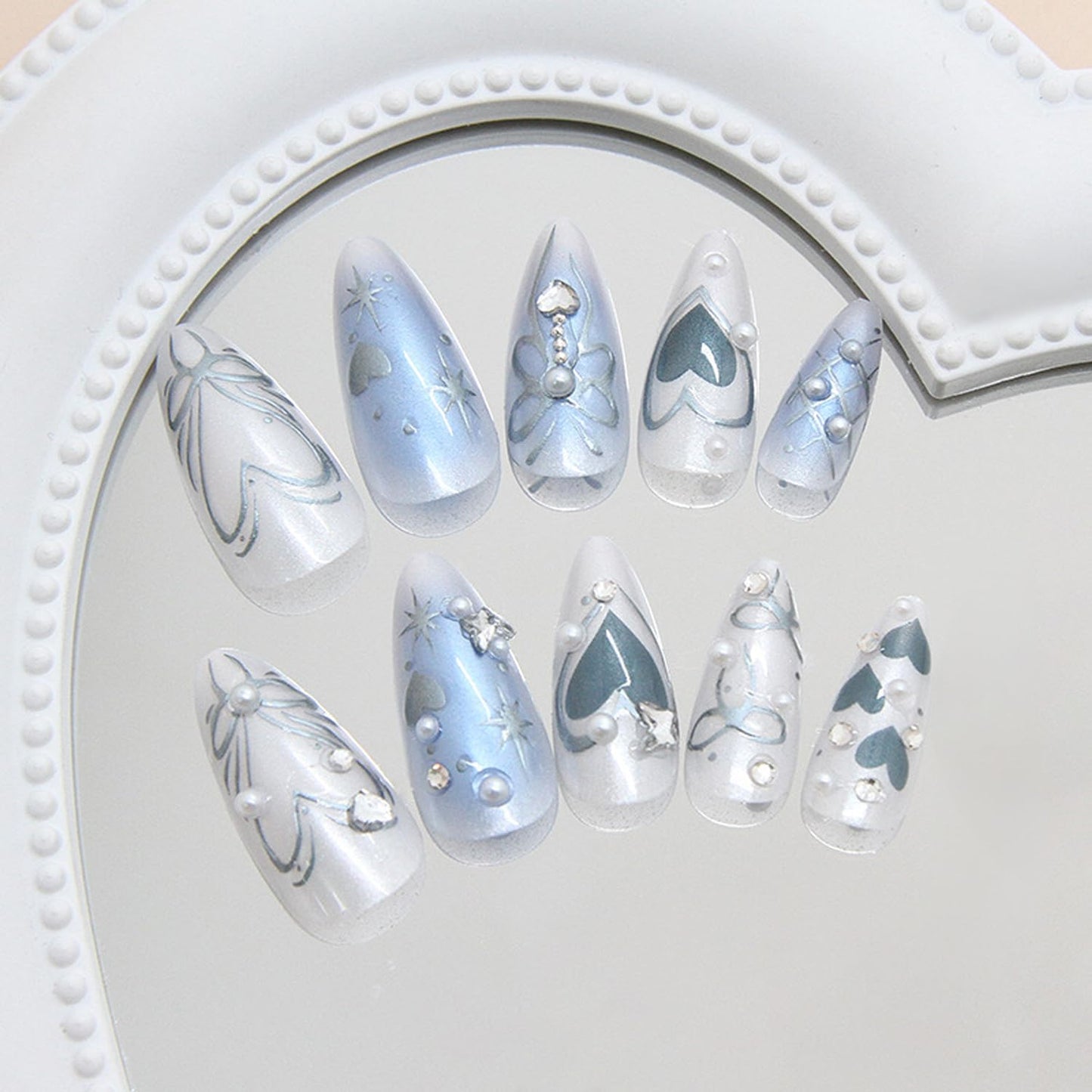 24Pcs Y2k Almond Fake Nail Medium Press on Nails with Blue Love Heart Silver Bow Butterfly Design French Press On Nail Flash Full Cover Artificial Glue on Nails Pearl Rhinestones Nails for Women