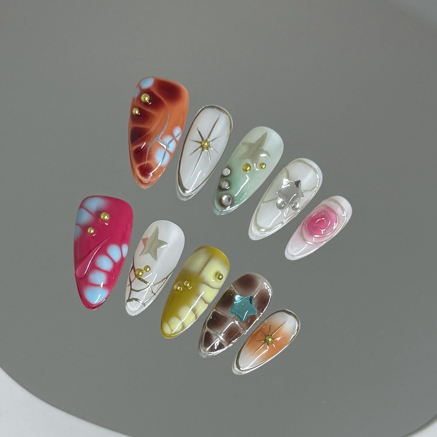 10Pcs Medium Almond Handmade Press On Nails | Easy Apply & Remove, Reusable Salon Quality Nails | Y2K Punk Multicolor Fake Nails with 3D Floral, Star & Gold Bead Accents(5U01, S)