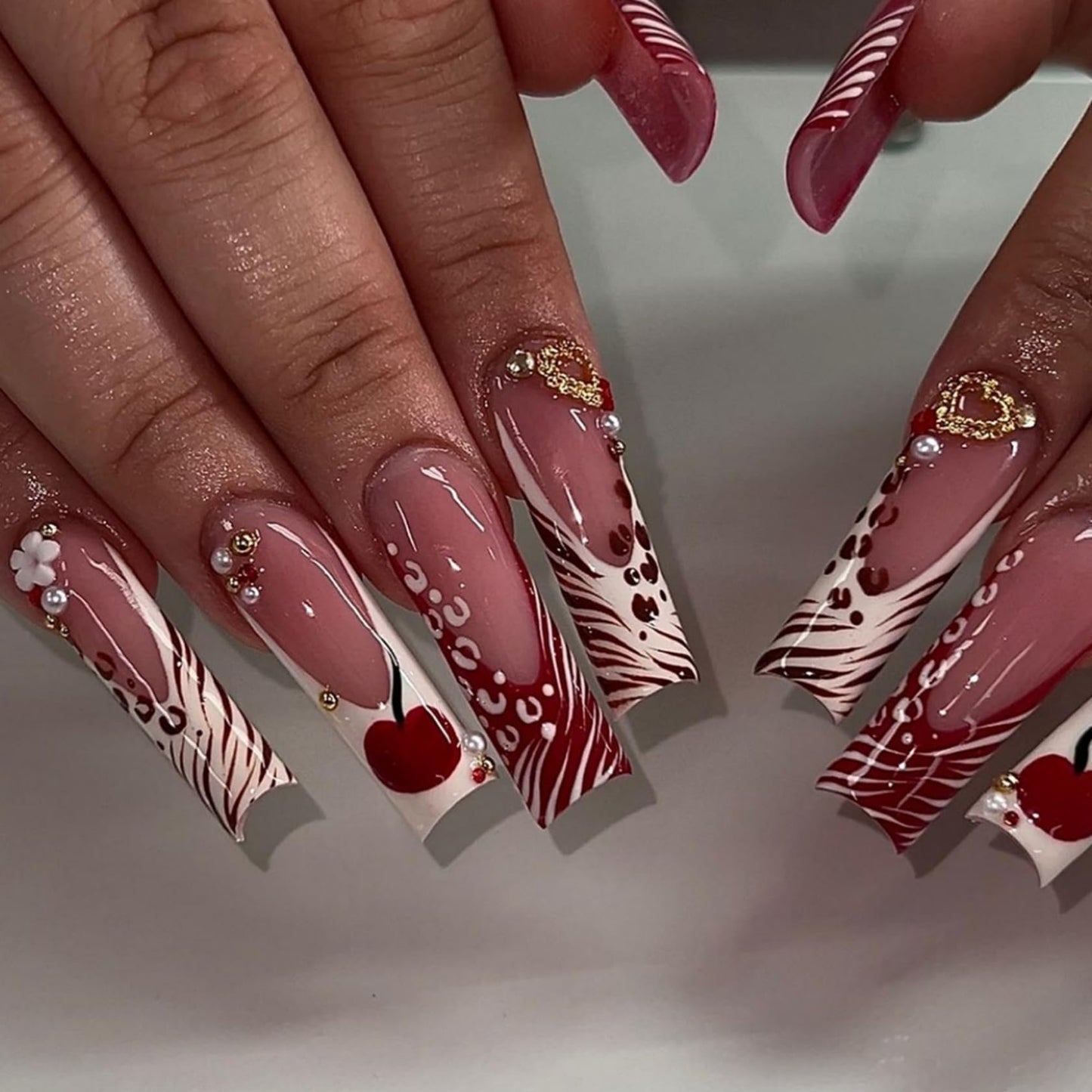 Long Square Press on Nails Fake Nails Artificial Nail Stick on Nail for Women, Red Cherry Design on Nude Pink with Pearl and Gold Accents