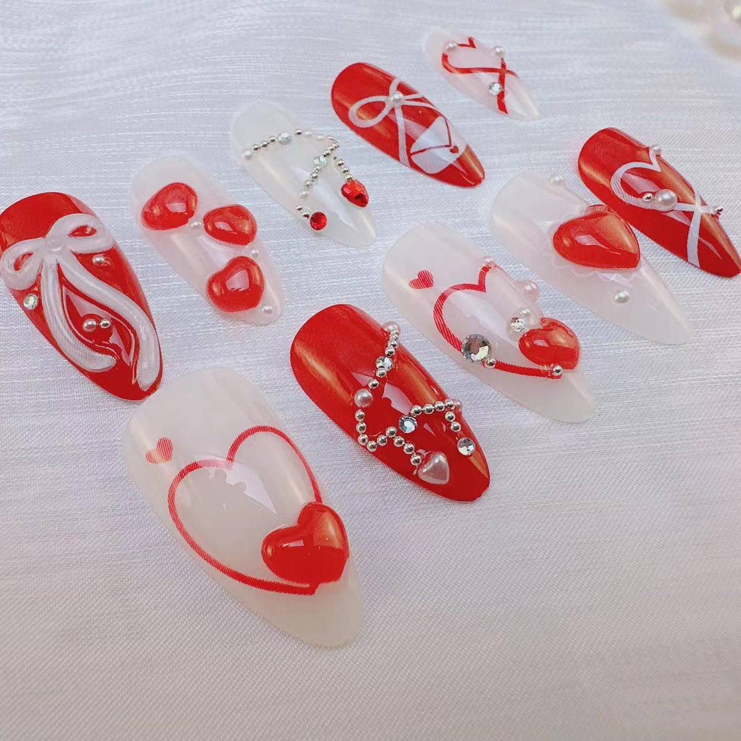 24Pcs Valentine's Love Press on Nails Almond Red Heart Fake Nails with 3D Bow Rhinestones Design French Tip False Nail White Pearl Stick on Nails Hearts Romantic Y2k Handmade Nail for Women