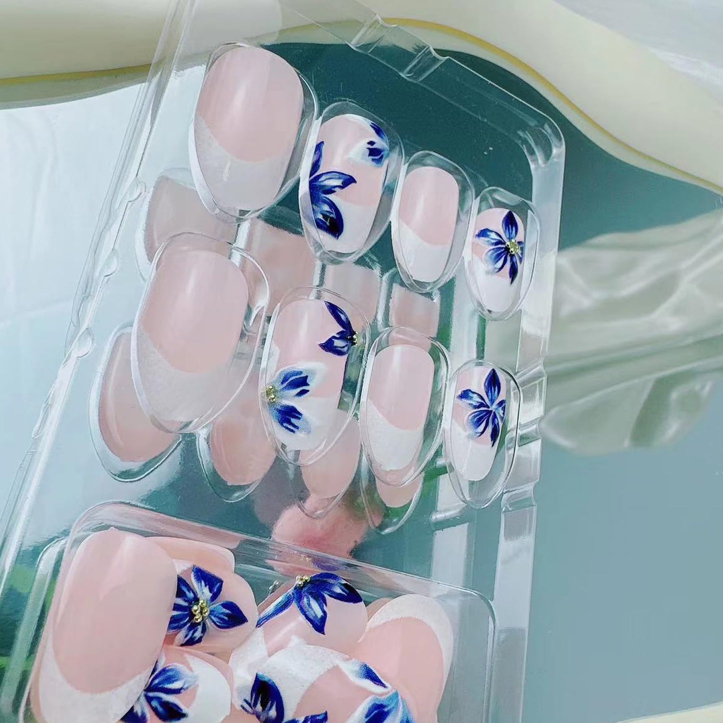 French Tip Press on Nails Short Almond Fake Nails Blue Flower Design Spring & Summer French Nails Press on Floral Designer Reusable Acrylic Nails 24 Pcs,Manicure Fingernails Daily Wear Nails for Women
