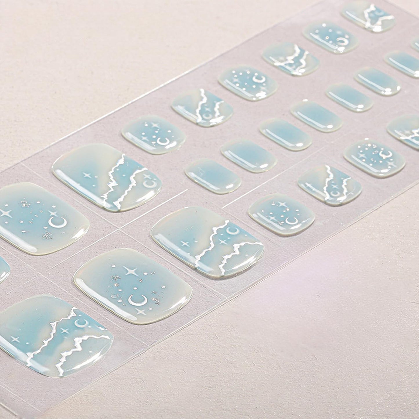 XEAOHESY 26pcs Semi Cured Gel Toe Nail Strips, Pedicure Nail Strips, Toe Nail Stickers, Needs to Be Cured, Come With Nail File, Wood Cuticle Stick, Plastic Press Stick（Cyan+Moon Star）