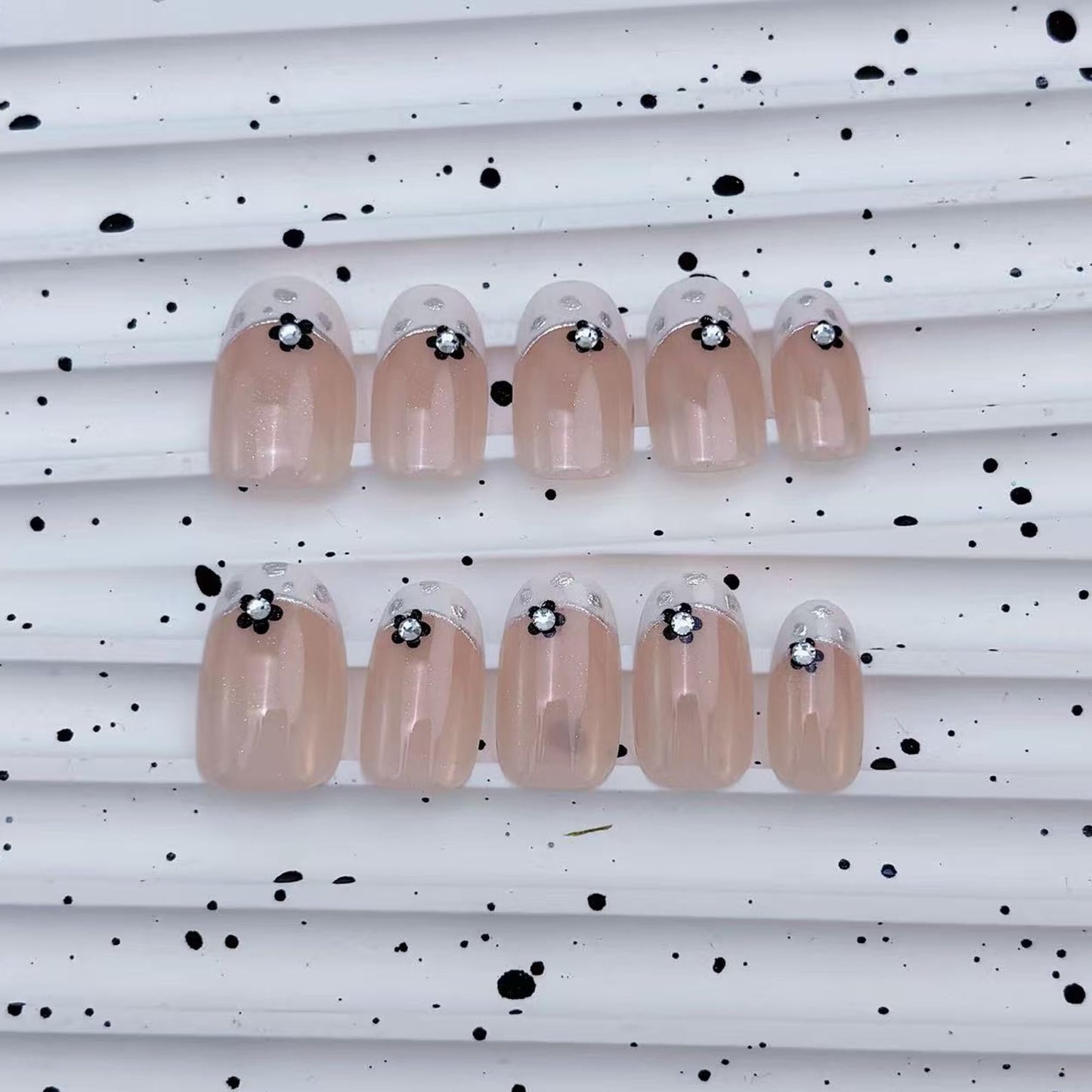 24Pcs French Tip Press On Nails Short Almond Fake Nails Nude Pink with Black Flowers & Silver Rhinestones Glossy Acrylic False Nails with Glitter Edge,Full Cover Stick On Nails for Women DIY Manicure