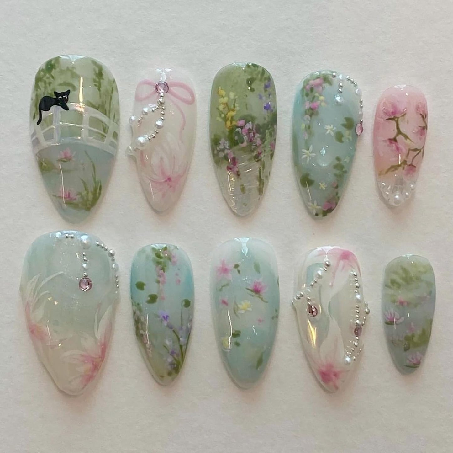 24Pcs Handmade Press on Nails Medium Almond Fake Nails Green Pink Flower Cute Cat Full Cover Glue on Nails Rhinestones Charms Glitter Designs Spring Summer False Nails for Women Girls Acrylic Nails