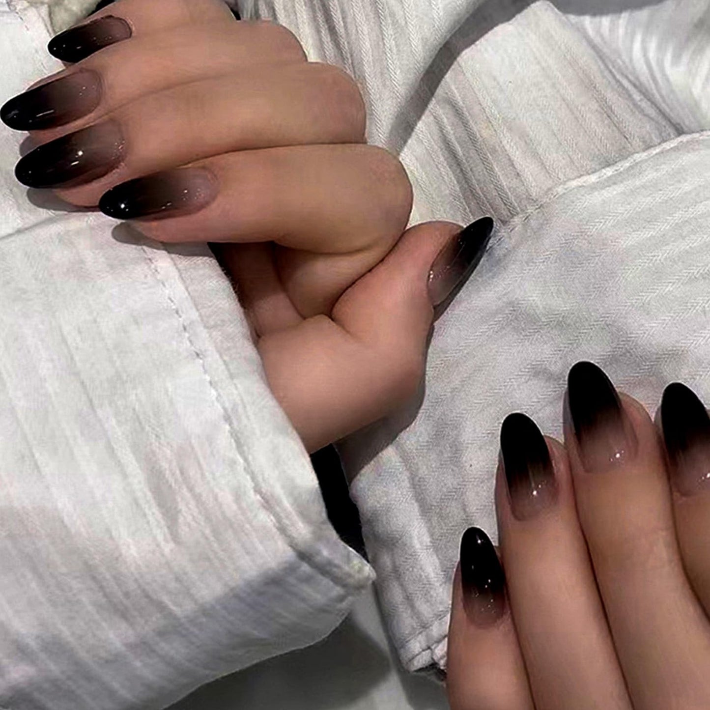 FJSMTOPl Black Press on Nails Almond Fake Nails Press ons Medium False Nails with Designs Ombre Black Acrylic Glue on Nails Halloween Stick on Nails for Women Nail Art Decoration 24Pcs