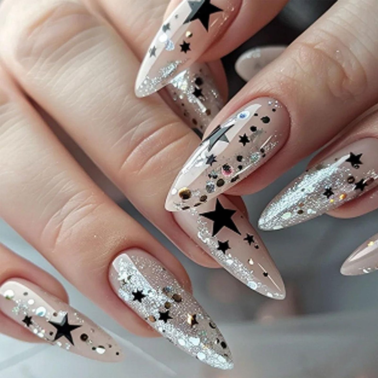 IMSOHOT Medium Press on Nails Almond Nude Fake Nails with Black Star & Silver Glitter Designs Full Cover Glossy Y2K Nail Supplies Acrylic DIY Nail Art Stick on False Nails for Women