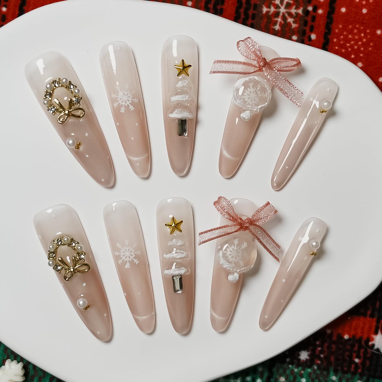 Tesytto Press On Nails Long Stiletto, Sheer Pink Glitter Nails with 3D Bow & Snowflake Design, Sparkly Silver French Tip Glossy Fake Nails, Full Cover Acrylic Nails (Christmas Snow Globe,M)