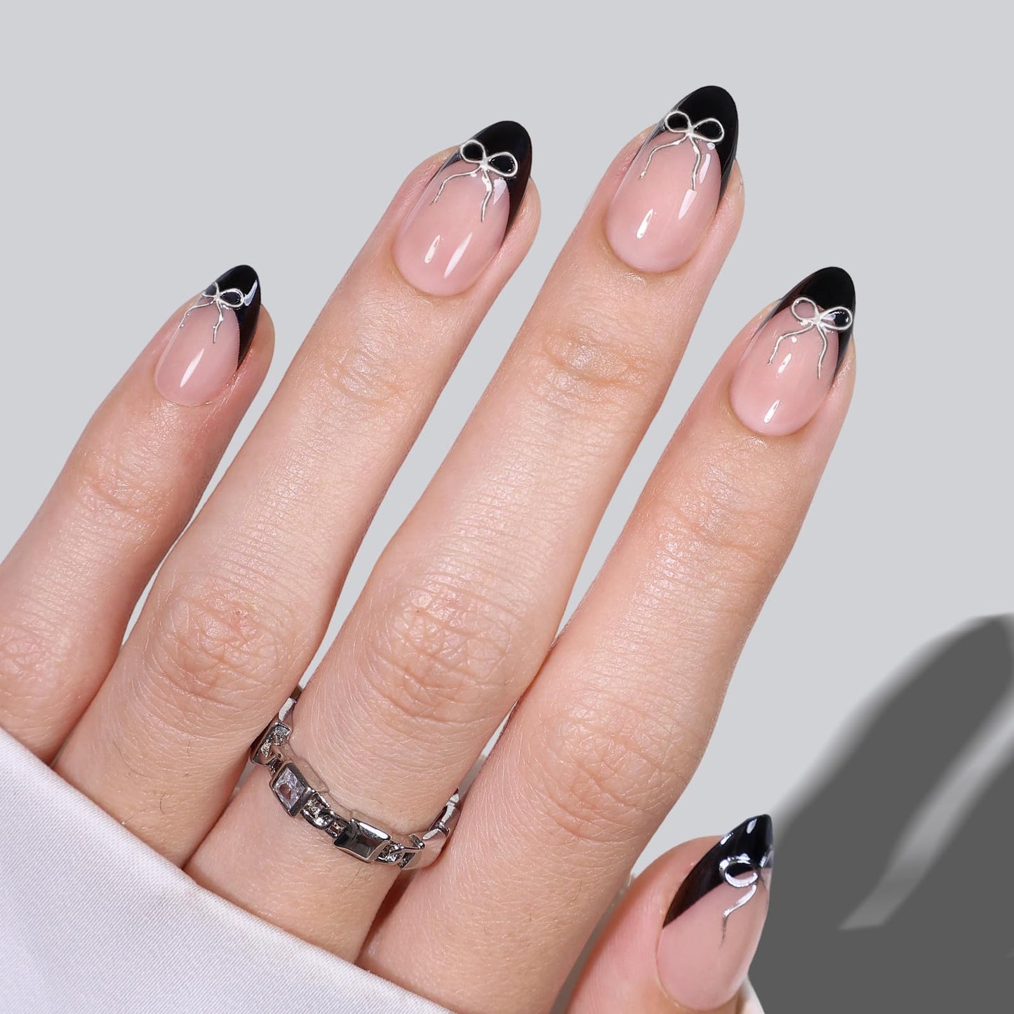 SHANGMENG Black French Tip Press on Nails Short with 3D Bow Design - Soft Gel Almond Fake Nails for Women Gift, Natural Stick on Nails with Glue in 16 Sizes - 32 Reusable Nails, Silver Ribbon
