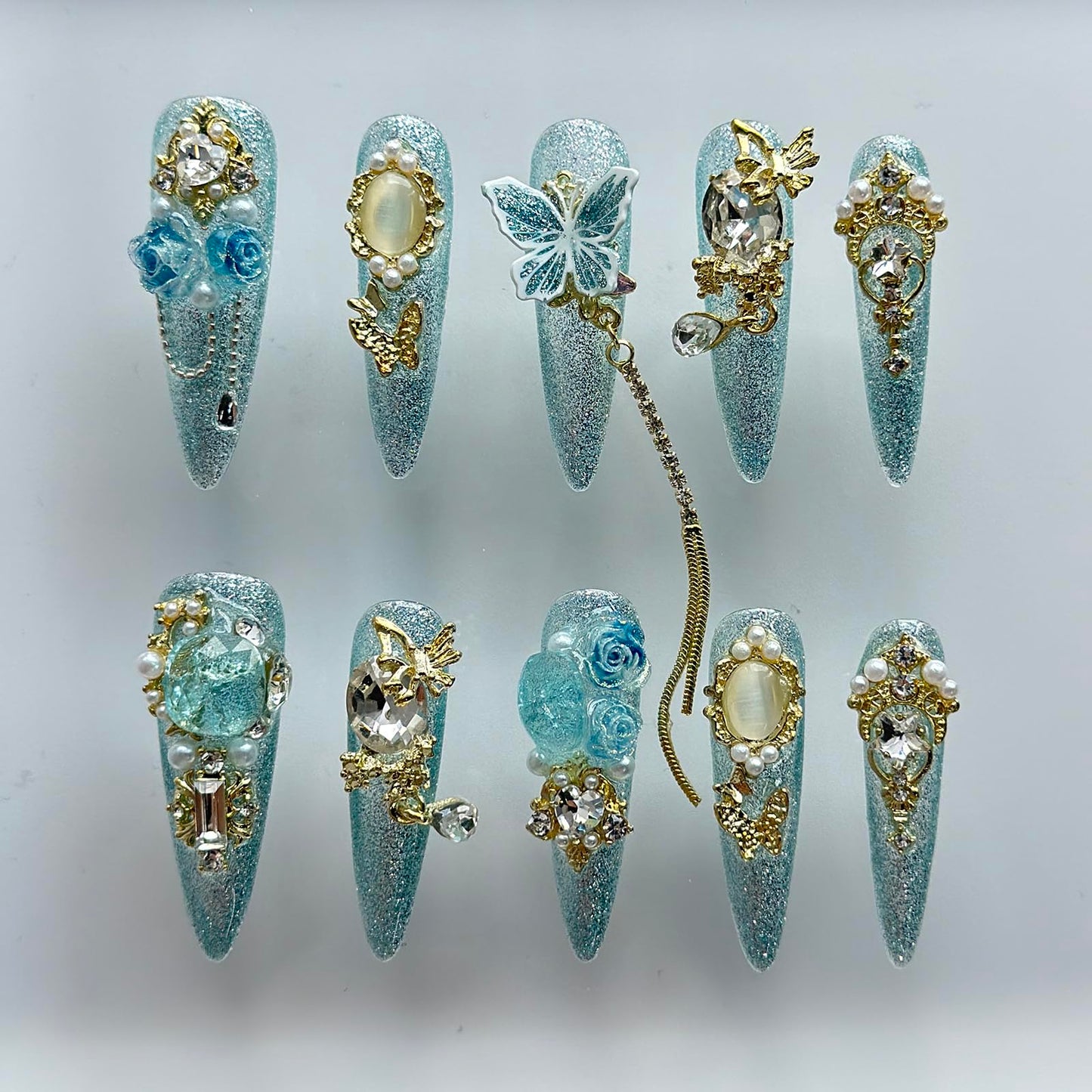 Luxury Press on Nails Long Almond Handmade 3D Unique Reusable ABS Material Fake Nails Light Blue Gothic False Nails with Designs Rhinestones Charms Glitter Glossy Glue on Thick Acrylic Nails(S)