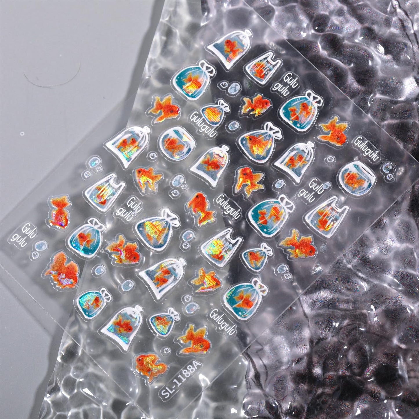 SIMAYKUWA Jelly Bag 3D Goldfish Nail Stickers - 5D Relief Ocean Theme Bubble Water Nail Art Decor, DIY Easy Apply Fake Nails for Women Girls, Cute Long Lasting Manicure Accessories A Set of 2 Sheets