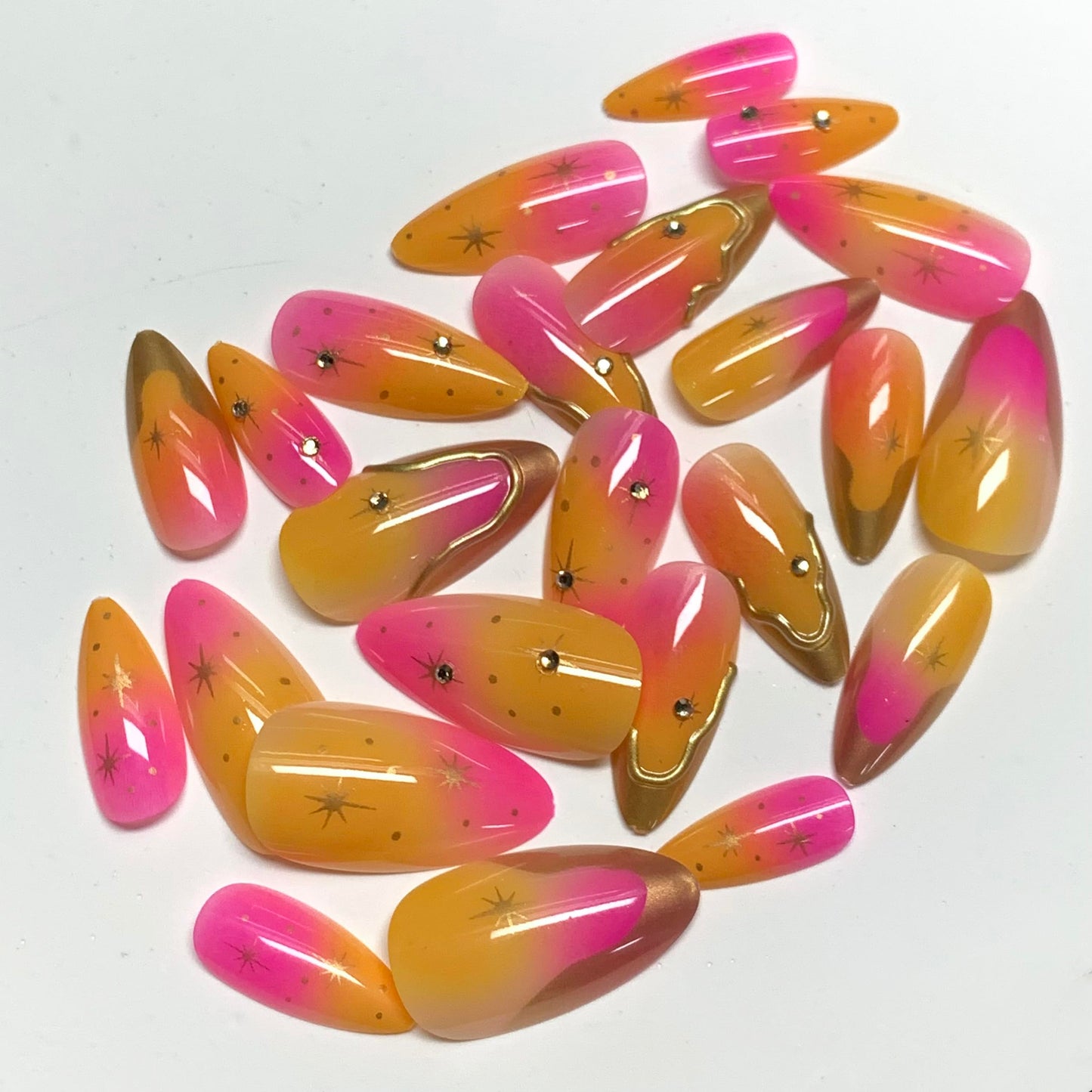 BABALAL Press On Nails, Medium Almond Fake Nails, Pink Orange Ombre With Gold Star Charm, Summer Bright Full Cover Glue On Nails For Women And Girls 24Pcs Reusable
