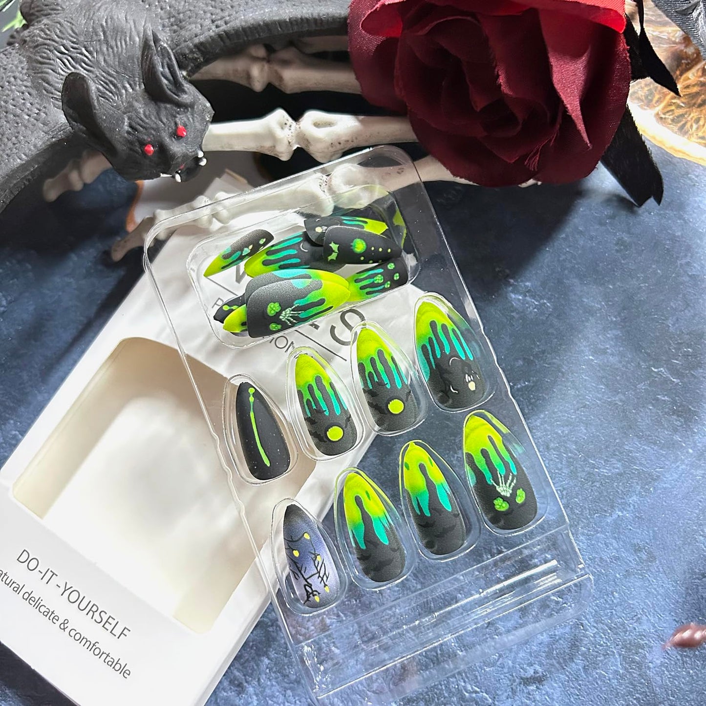 CJDLTS 24Pcs Halloween Fluorescence Press on Nails Long Bat Candle Skull Pattern Halloween Nail Full Cover Artificial Acrylic Fingernails French Tip Almond Stick on Nails for Women Festival Decoration