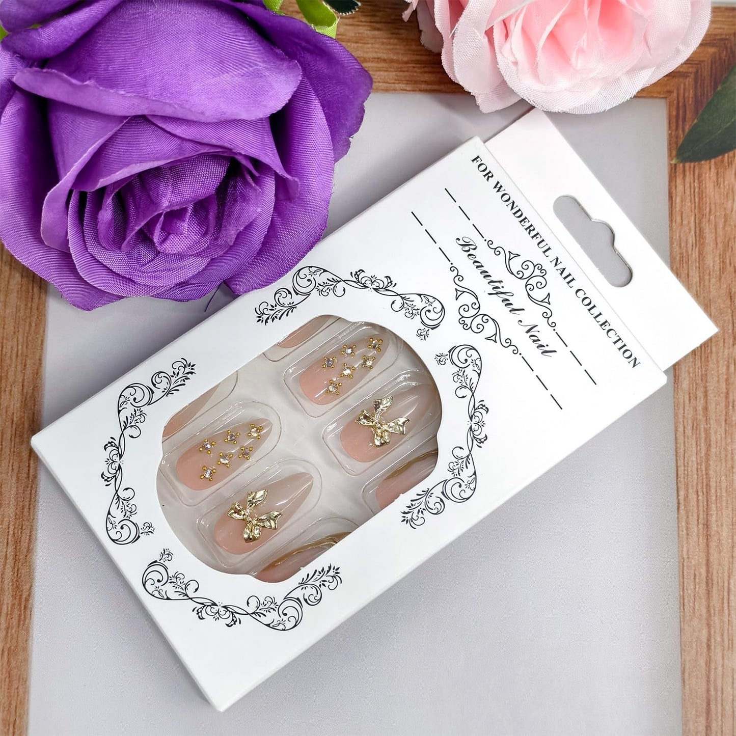 24Pcs Nude Pink Press on Nails Almond Shaped Artificial Acrylic French Metal Irregular Lines Design 3D Metallic Bow with Stars Fake Nails Medium Glossy Stick on Nail Artificial Fingernails for Women