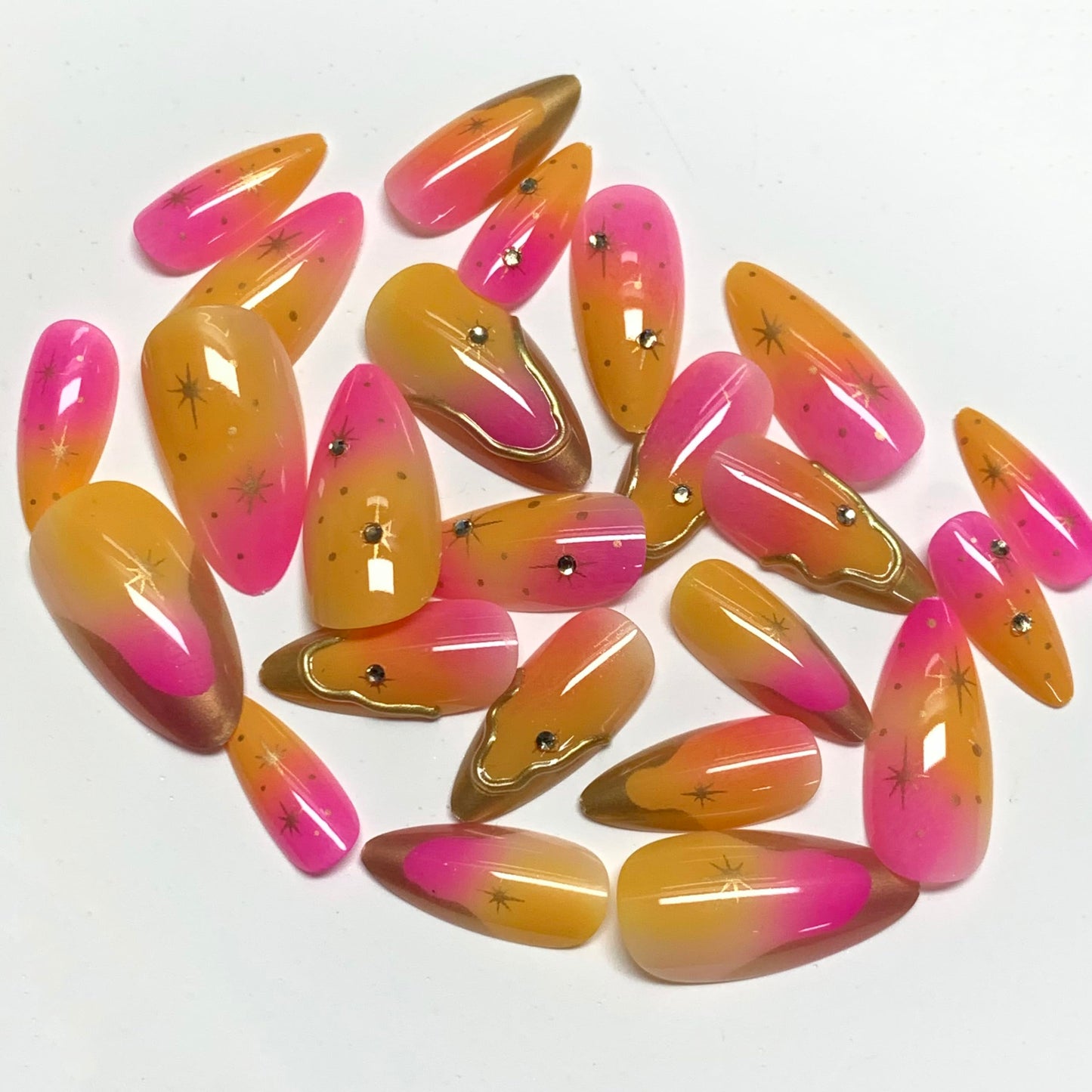 BABALAL Press On Nails, Medium Almond Fake Nails, Pink Orange Ombre With Gold Star Charm, Summer Bright Full Cover Glue On Nails For Women And Girls 24Pcs Reusable