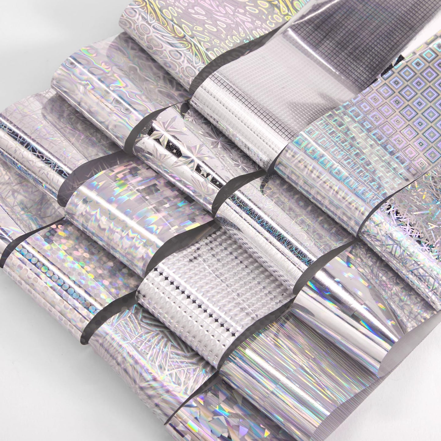 DANNEASY 300 Sheets Holographic Nail Foils Film, Iridescent Nail Art Transfer Foil Stickers Gold Metallic Neon Foil Paper Sheets Starry Sky Star Design Sticker for Nails Decoration Supplies