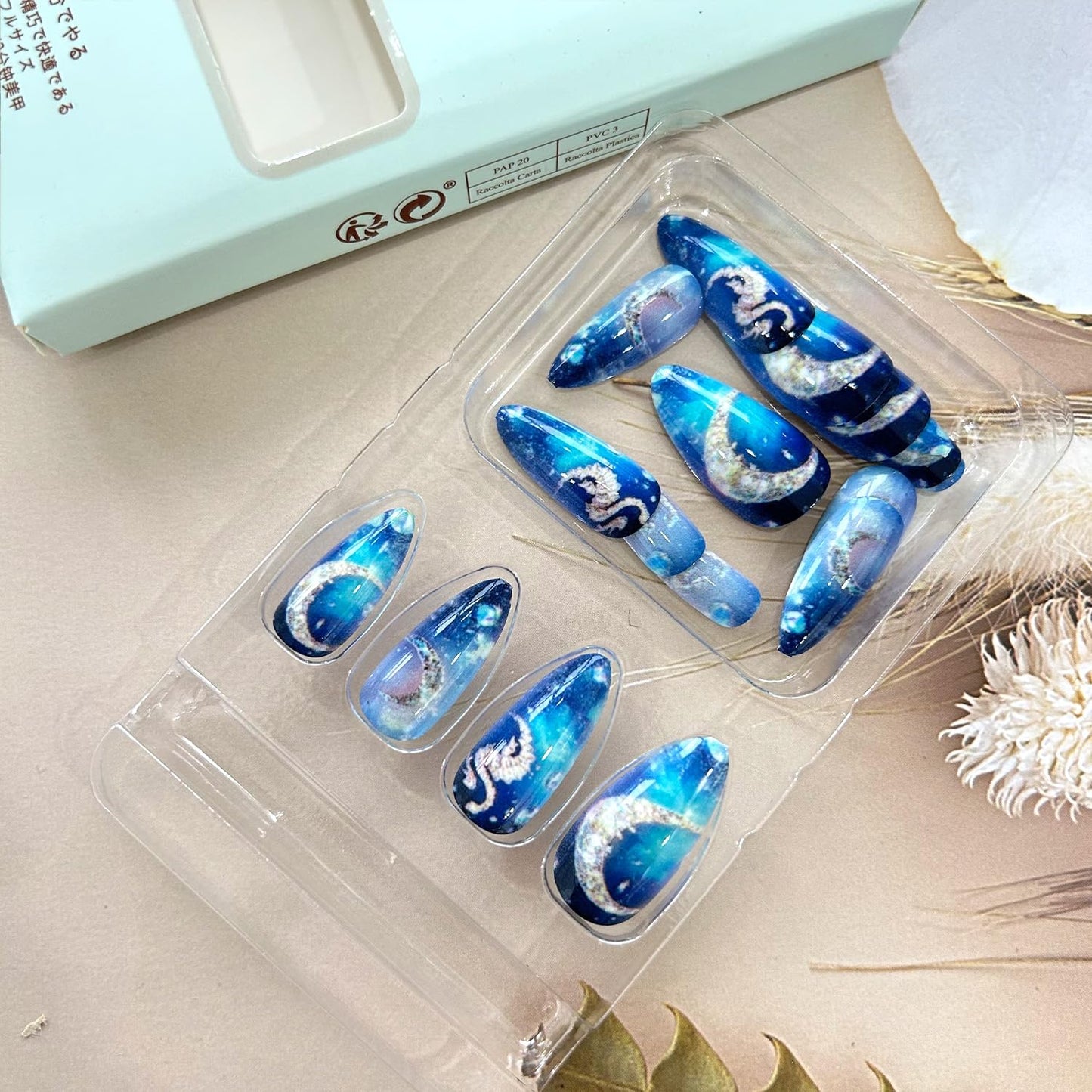 24Pcs Dark Blue Starry Sky Press on Nails Medium Almond Shaped Moon Planet Pattern Design Handmade False Nails Full Cover Glossy Acrylic Atrificial Fingernails Blue Smudge DIY Stick on Nails for Women