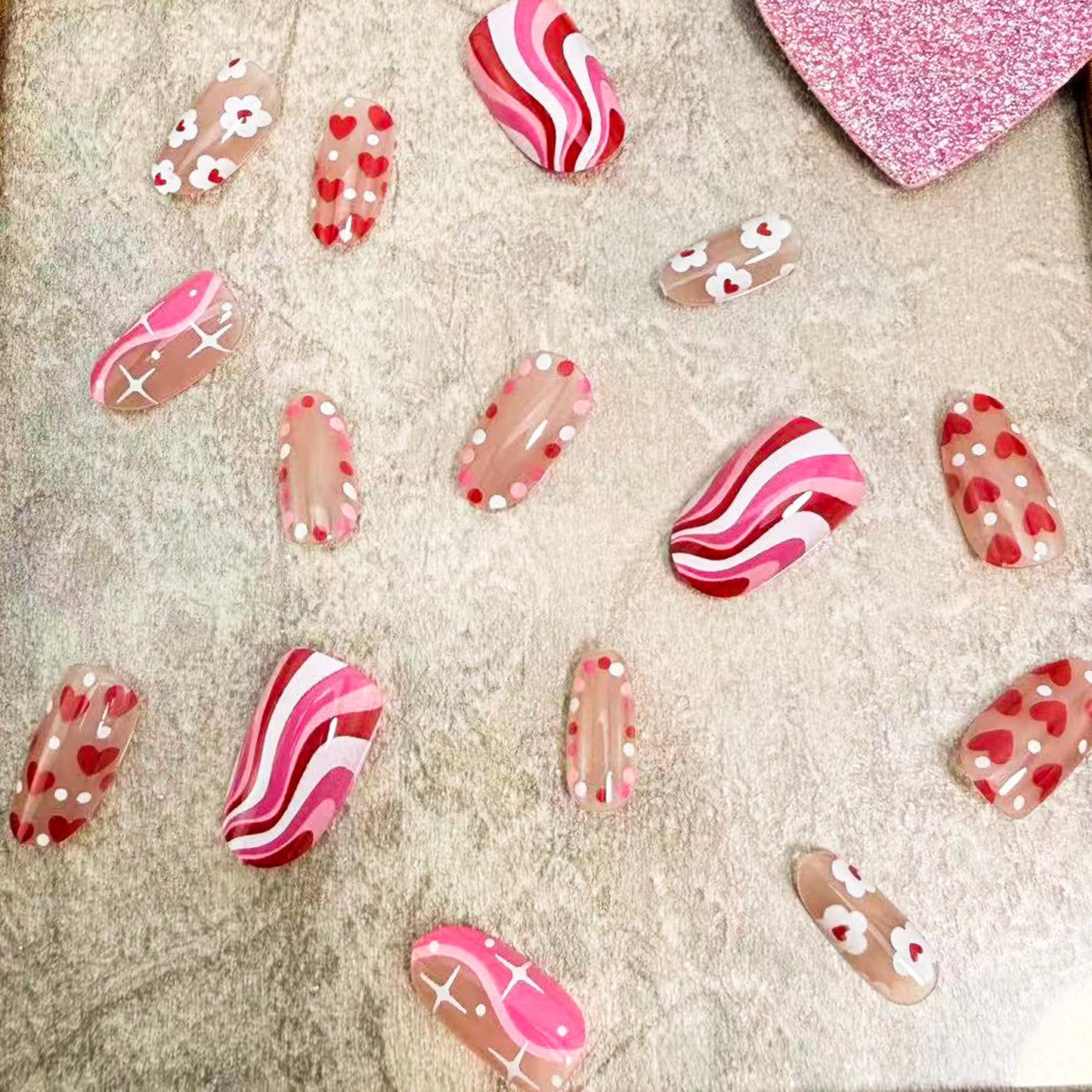 24Pcs Valentines Press on Nails Short Almond Red Heart Fake Nails with Flower Stripe Star Design Glue on Nails Pink Glossy Holiday False Nails for Women DIY Valentine Nail Decoration Supplies